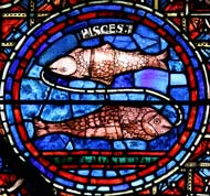 O signo de Peixes num dos vitrais da Catedral de Chartres, Frana.